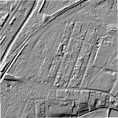 Shaded relief map of the ground around M328PN, computed from Environment Agency LiDAR. The ground here sits at about 27 m above sea level and falls 11 m across the surrounding 800 m. Surface water reaching this point runs off ground lying to the north, 2.2 m higher.