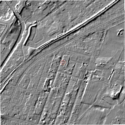 Shaded relief map of the ground around M328PP, computed from Environment Agency LiDAR. The ground here sits at about 26 m above sea level and falls 8 m across the surrounding 800 m. Surface water reaching this point runs off ground lying to the south-west, 2.9 m higher.