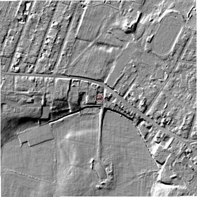 Shaded relief map of the ground around M328QD, computed from Environment Agency LiDAR. The ground here sits at about 25 m above sea level and falls 9 m across the surrounding 800 m. Surface water reaching this point runs off ground lying to the north-north-east, 6.0 m higher.