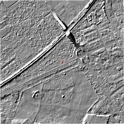 Shaded relief map of the ground around M328QQ, computed from Environment Agency LiDAR. The ground here sits at about 27 m above sea level and falls 8 m across the surrounding 800 m. Surface water reaching this point runs off ground lying to the north-north-east, 5.7 m higher.