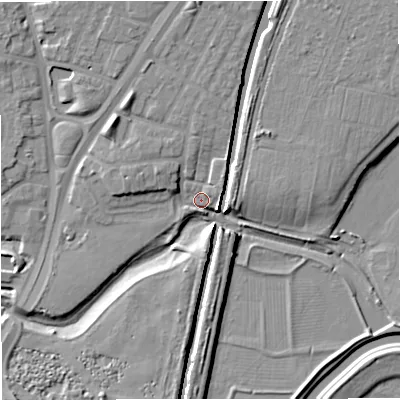 Shaded relief map of the ground around M328WE, computed from Environment Agency LiDAR. The ground here sits at about 23 m above sea level and falls 9 m across the surrounding 800 m. Surface water reaching this point runs off ground lying to the west-north-west, 5.7 m higher.