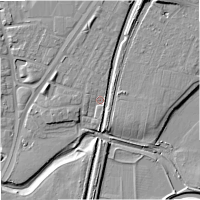 Shaded relief map of the ground around M328WF, computed from Environment Agency LiDAR. The ground here sits at about 25 m above sea level and falls 12 m across the surrounding 800 m. Surface water reaching this point runs off ground lying to the north-north-west, 2.0 m higher.