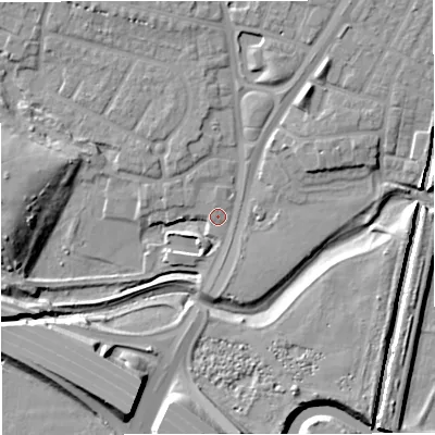 Shaded relief map of the ground around M329AU, computed from Environment Agency LiDAR. The ground here sits at about 22 m above sea level and falls 14 m across the surrounding 800 m. Surface water reaching this point runs off ground lying to the north-east, 7.9 m higher.