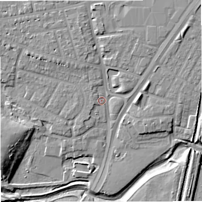 Shaded relief map of the ground around M329FA, computed from Environment Agency LiDAR. The ground here sits at about 23 m above sea level and falls 14 m across the surrounding 800 m. Surface water reaching this point runs off ground lying to the north, 5.6 m higher.
