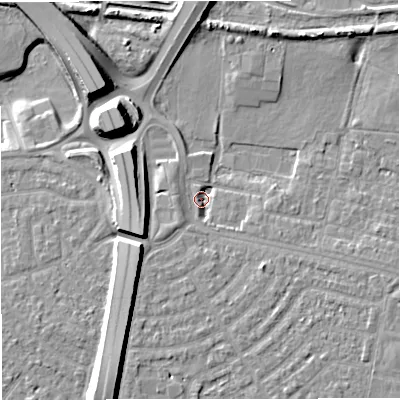 Shaded relief map of the ground around M329TR, computed from Environment Agency LiDAR. The ground here sits at about 22 m above sea level and falls 11 m across the surrounding 800 m. Surface water reaching this point runs off ground lying to the north-east, 5.3 m higher.