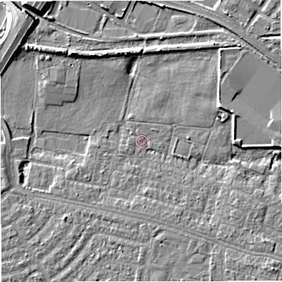 Shaded relief map of the ground around M329TW, computed from Environment Agency LiDAR. The ground here sits at about 22 m above sea level and falls 9 m across the surrounding 800 m. Surface water reaching this point runs off ground lying to the east-north-east, 4.9 m higher.