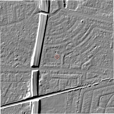 Shaded relief map of the ground around M329US, computed from Environment Agency LiDAR. The ground here sits at about 23 m above sea level and falls 11 m across the surrounding 800 m. Surface water reaching this point runs off ground lying to the east-north-east, 1.6 m higher.