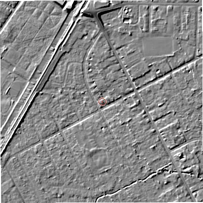 Shaded relief map of the ground around M333SX, computed from Environment Agency LiDAR. The ground here sits at about 26 m above sea level and falls 7 m across the surrounding 800 m. Surface water reaching this point runs off ground lying to the north, 6.1 m higher.