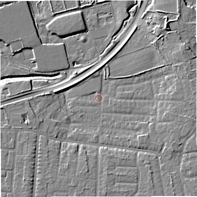 Shaded relief map of the ground around M335WW, computed from Environment Agency LiDAR. The ground here sits at about 20 m above sea level and falls 12 m across the surrounding 800 m. Surface water reaching this point runs off ground lying to the south-east, 5.2 m higher.