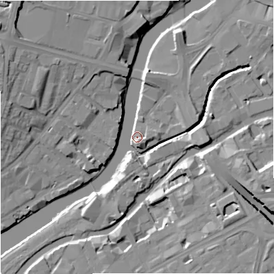 Shaded relief map of the ground around M34JE, computed from Environment Agency LiDAR. The ground here sits at about 25 m above sea level and falls 15 m across the surrounding 800 m. Surface water reaching this point runs off ground lying to the north-north-west, 8.8 m higher.