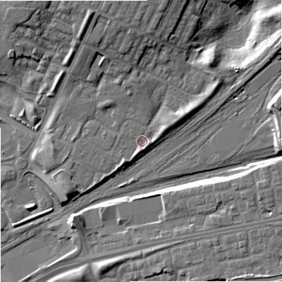 Shaded relief map of the ground around M405LJ, computed from Environment Agency LiDAR. The ground here sits at about 81 m above sea level and falls 16 m across the surrounding 800 m. Surface water reaching this point runs off ground lying to the east-north-east, 3.1 m higher.