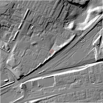 Shaded relief map of the ground around M405LL, computed from Environment Agency LiDAR. The ground here sits at about 81 m above sea level and falls 17 m across the surrounding 800 m. Surface water reaching this point runs off ground lying to the north, 7.0 m higher.