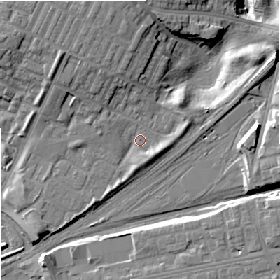 Shaded relief map of the ground around M405LN, computed from Environment Agency LiDAR. The ground here sits at about 81 m above sea level and falls 21 m across the surrounding 800 m. Surface water reaching this point runs off ground lying to the north-north-west, 7.0 m higher.