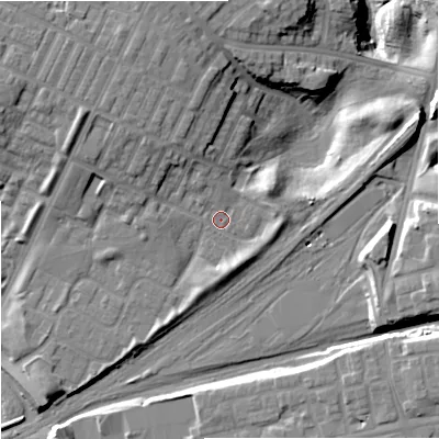 Shaded relief map of the ground around M405NP, computed from Environment Agency LiDAR. The ground here sits at about 81 m above sea level and falls 21 m across the surrounding 800 m. Surface water reaching this point runs off ground lying to the north-north-west, 2.3 m higher.