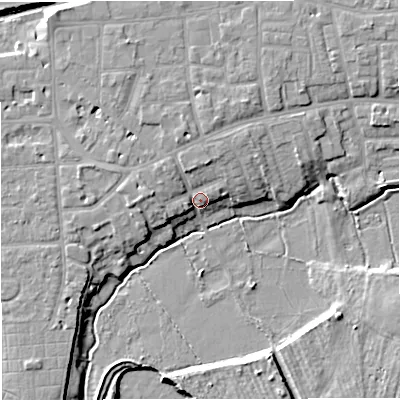 Shaded relief map of the ground around M419LB, computed from Environment Agency LiDAR. The ground here sits at about 22 m above sea level and falls 10 m across the surrounding 800 m. Surface water reaching this point runs off ground lying to the west, 5.6 m higher.