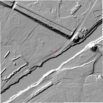 Shaded relief map of the ground around M445GH, computed from Environment Agency LiDAR. The ground here sits at about 13 m above sea level and falls 23 m across the surrounding 800 m. Surface water reaching this point runs off ground lying to the west-south-west, 2.0 m higher.
