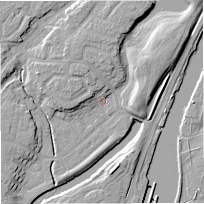 Shaded relief map of the ground around M446DU, computed from Environment Agency LiDAR. The ground here sits at about 15 m above sea level and falls 14 m across the surrounding 800 m. Surface water reaching this point runs off ground lying to the north-east, 9.1 m higher.