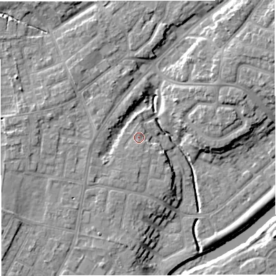 Shaded relief map of the ground around M446RB, computed from Environment Agency LiDAR. The ground here sits at about 18 m above sea level and falls 11 m across the surrounding 800 m. Surface water reaching this point runs off ground lying to the south, 1.4 m higher.