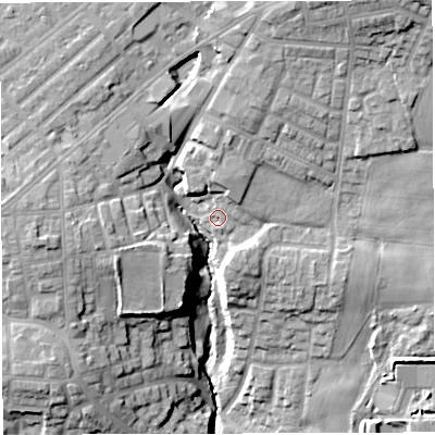 Shaded relief map of the ground around M469DB, computed from Environment Agency LiDAR. The ground here sits at about 56 m above sea level and falls 29 m across the surrounding 800 m. Surface water reaching this point runs off ground lying to the north-north-east, 3.9 m higher.
