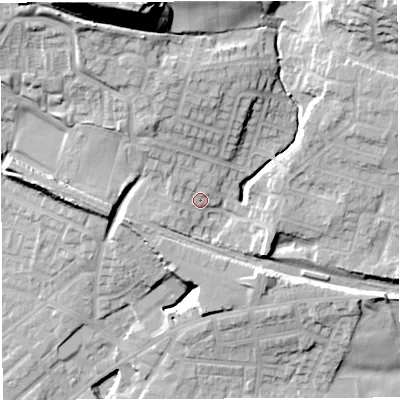 Shaded relief map of the ground around M469HT, computed from Environment Agency LiDAR. The ground here sits at about 69 m above sea level and falls 44 m across the surrounding 800 m. Surface water reaching this point runs off ground lying to the north-north-west, 5.4 m higher.