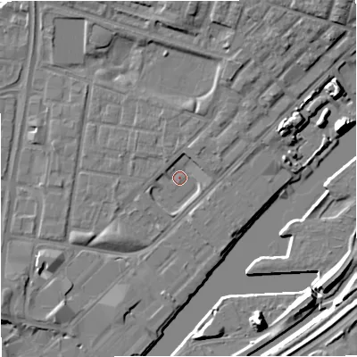 Shaded relief map of the ground around M53AN, computed from Environment Agency LiDAR. The ground here sits at about 23 m above sea level and falls 11 m across the surrounding 800 m. Surface water reaching this point runs off ground lying to the north-east, 2.5 m higher.