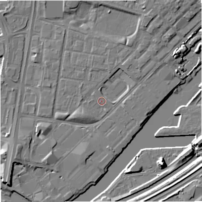 Shaded relief map of the ground around M53FX, computed from Environment Agency LiDAR. The ground here sits at about 24 m above sea level and falls 10 m across the surrounding 800 m. Surface water reaching this point runs off ground lying to the north-east, 2.5 m higher.