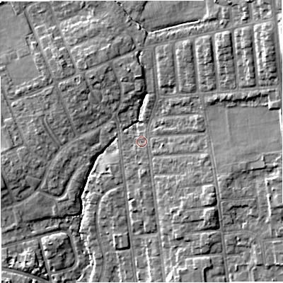 Shaded relief map of the ground around M68EF, computed from Environment Agency LiDAR. The ground here sits at about 38 m above sea level and falls 15 m across the surrounding 800 m. Surface water reaching this point runs off ground lying to the east-south-east, 3.4 m higher.