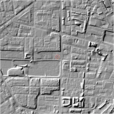 Shaded relief map of the ground around M71BU, computed from Environment Agency LiDAR. The ground here sits at about 26 m above sea level and falls 8 m across the surrounding 800 m. Surface water reaching this point runs off ground lying to the east-north-east, 5.9 m higher.