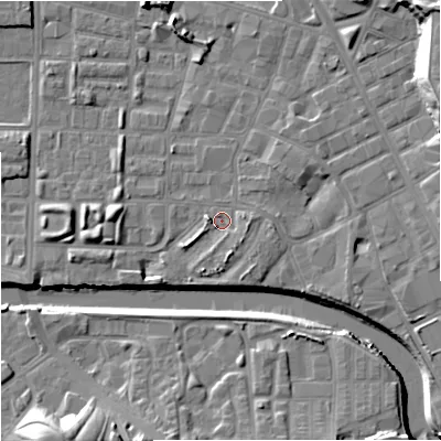 Shaded relief map of the ground around M71TP, computed from Environment Agency LiDAR. The ground here sits at about 27 m above sea level and falls 20 m across the surrounding 800 m. Surface water reaching this point runs off ground lying to the south-east, 1.9 m higher.