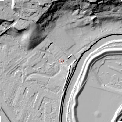 Shaded relief map of the ground around M73FT, computed from Environment Agency LiDAR. The ground here sits at about 29 m above sea level and falls 43 m across the surrounding 800 m. Surface water reaching this point runs off ground lying to the north-north-west, 35.5 m higher.