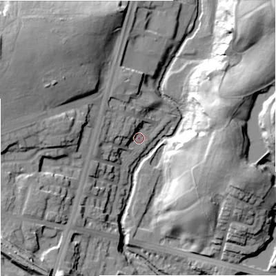 Shaded relief map of the ground around M84ND, computed from Environment Agency LiDAR. The ground here sits at about 57 m above sea level and falls 34 m across the surrounding 800 m. Surface water reaching this point runs off ground lying to the west-north-west, 7.1 m higher.