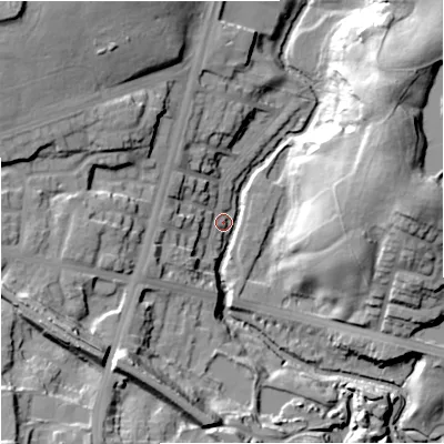 Shaded relief map of the ground around M84NE, computed from Environment Agency LiDAR. The ground here sits at about 56 m above sea level and falls 34 m across the surrounding 800 m. Surface water reaching this point runs off ground lying to the south-west, 32.3 m higher.