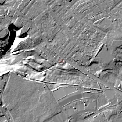 Shaded relief map of the ground around M94NX, computed from Environment Agency LiDAR. The ground here sits at about 74 m above sea level and falls 33 m across the surrounding 800 m. Surface water reaching this point runs off ground lying to the east-north-east, 16.8 m higher.