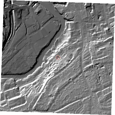 Shaded relief map of the ground around ME156YJ, computed from Environment Agency LiDAR. The ground here sits at about 12 m above sea level and falls 42 m across the surrounding 800 m. Surface water reaching this point runs off ground lying to the east-south-east, 10.3 m higher.