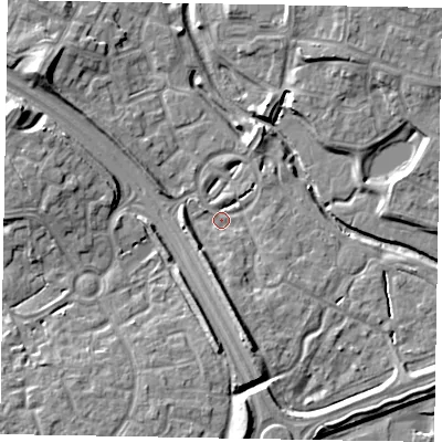 Shaded relief map of the ground around MK109LL, computed from Environment Agency LiDAR. The ground here sits at about 61 m above sea level and falls 10 m across the surrounding 800 m. Surface water reaching this point runs off ground lying to the south, 5.6 m higher.