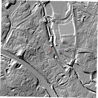 Shaded relief map of the ground around MK109NN, computed from Environment Agency LiDAR. The ground here sits at about 61 m above sea level and falls 11 m across the surrounding 800 m. The ground contributing surface water to this point lies to the south.