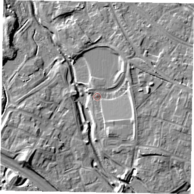 Shaded relief map of the ground around MK109NY, computed from Environment Agency LiDAR. The ground here sits at about 61 m above sea level and falls 11 m across the surrounding 800 m. Surface water reaching this point runs off ground lying to the north-east, 5.2 m higher.