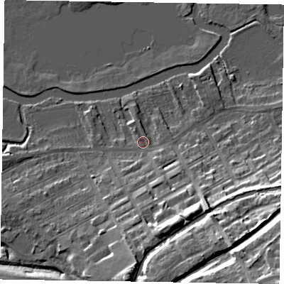 Shaded relief map of the ground around MK130AA, computed from Environment Agency LiDAR. The ground here sits at about 62 m above sea level and falls 28 m across the surrounding 800 m. Surface water reaching this point runs off ground lying to the south, 8.7 m higher.