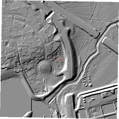 Shaded relief map of the ground around MK159LZ, computed from Environment Agency LiDAR. The ground here sits at about 60 m above sea level and falls 12 m across the surrounding 800 m. Surface water reaching this point runs off ground lying to the west-north-west, 9.5 m higher.