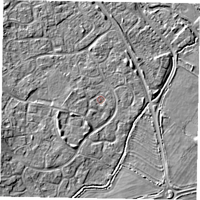 Shaded relief map of the ground around MK160JG, computed from Environment Agency LiDAR. The ground here sits at about 57 m above sea level and falls 7 m across the surrounding 800 m. Surface water reaching this point runs off ground lying to the south-west, 3.2 m higher.