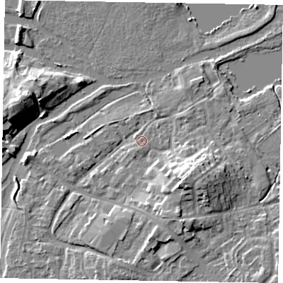 Shaded relief map of the ground around MK169BP, computed from Environment Agency LiDAR. The ground here sits at about 56 m above sea level and falls 11 m across the surrounding 800 m. Surface water reaching this point runs off ground lying to the south-east, 7.1 m higher.