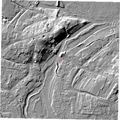 Shaded relief map of the ground around MK169BQ, computed from Environment Agency LiDAR. The ground here sits at about 54 m above sea level and falls 10 m across the surrounding 800 m. Surface water reaching this point runs off ground lying to the south-south-east, 2.3 m higher.