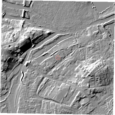 Shaded relief map of the ground around MK169EJ, computed from Environment Agency LiDAR. The ground here sits at about 55 m above sea level and falls 11 m across the surrounding 800 m. The ground contributing surface water to this point lies to the east-north-east.