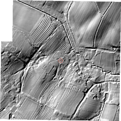 Shaded relief map of the ground around MK182BU, computed from Environment Agency LiDAR. The ground here sits at about 82 m above sea level and falls 26 m across the surrounding 800 m. Surface water reaching this point runs off ground lying to the south-west, 7.1 m higher.