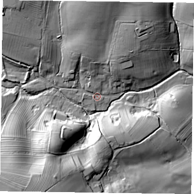 Shaded relief map of the ground around MK185NU, computed from Environment Agency LiDAR. The ground here sits at about 81 m above sea level and falls 31 m across the surrounding 800 m. Surface water reaching this point runs off ground lying to the north, 11.5 m higher.