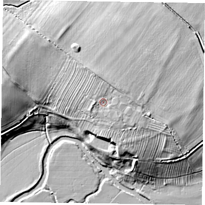 Shaded relief map of the ground around MK196DG, computed from Environment Agency LiDAR. The ground here sits at about 77 m above sea level and falls 12 m across the surrounding 800 m. Surface water reaching this point runs off ground lying to the west-south-west, 1.2 m higher.