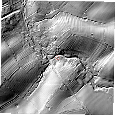 Shaded relief map of the ground around MK196DZ, computed from Environment Agency LiDAR. The ground here sits at about 70 m above sea level and falls 24 m across the surrounding 800 m. Surface water reaching this point runs off ground lying to the east-north-east, 20.6 m higher.
