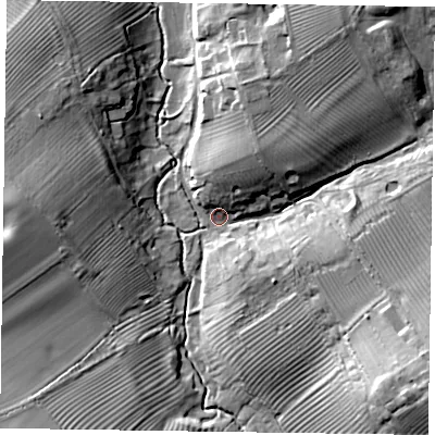 Shaded relief map of the ground around MK196EQ, computed from Environment Agency LiDAR. The ground here sits at about 69 m above sea level and falls 20 m across the surrounding 800 m. Surface water reaching this point runs off ground lying to the south-east, 18.4 m higher.