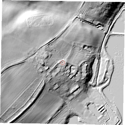 Shaded relief map of the ground around MK197EB, computed from Environment Agency LiDAR. The ground here sits at about 72 m above sea level and falls 29 m across the surrounding 800 m. Surface water reaching this point runs off ground lying to the west, 6.5 m higher.