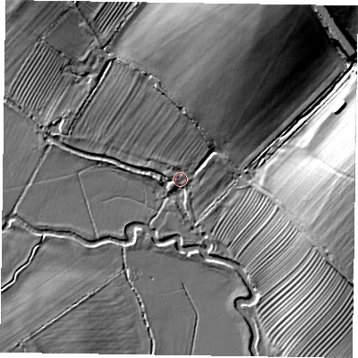 Shaded relief map of the ground around MK197HS, computed from Environment Agency LiDAR. The ground here sits at about 66 m above sea level and falls 18 m across the surrounding 800 m. Surface water reaching this point runs off ground lying to the north-north-east, 17.5 m higher.